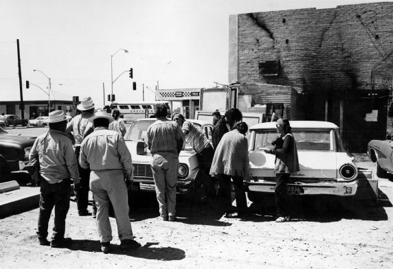 (3177) Workers in front of a field office damaged by arson, location unknown, 1970s (3177) Workers in front of a field office damaged by arson, location unknown, 1970s